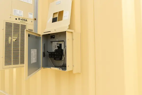 Container with breaker box and electrical wiring