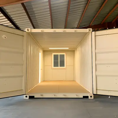 Container with interior lighting fixtures