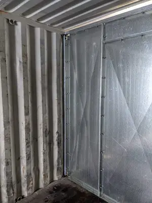 Container with metal partition