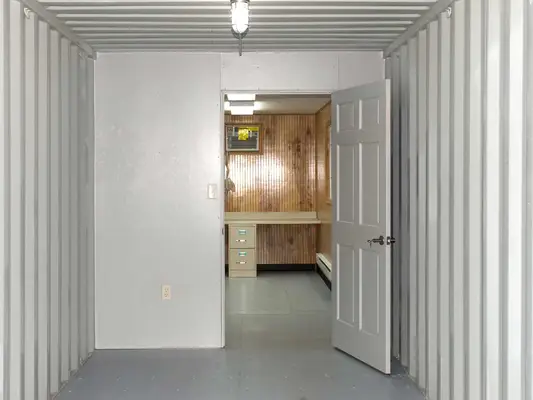 Container with partition wall
